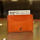 Chestnut leather card holder with dodo stamp, front pocket size