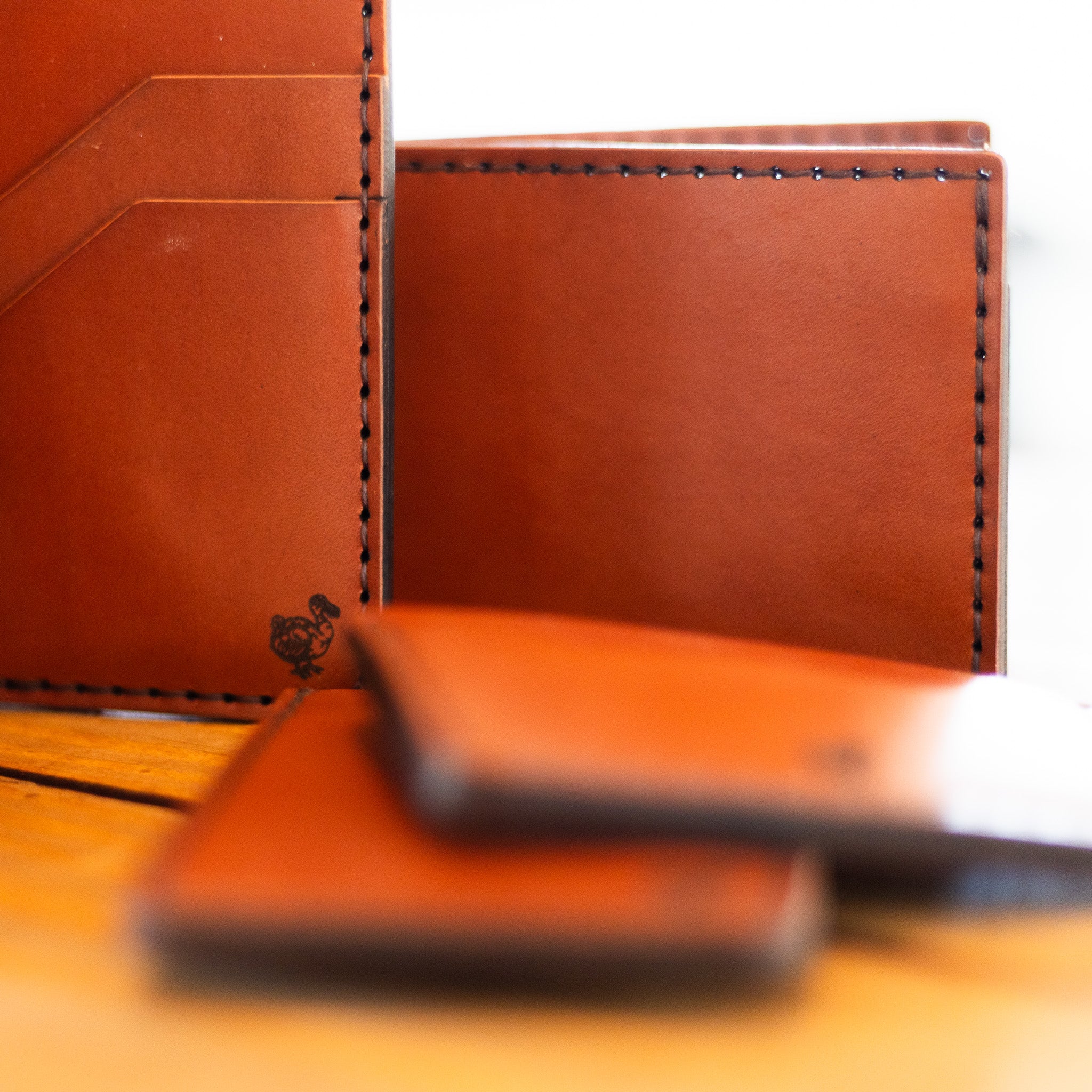DODOcase leather bifold and card wallets grouped, chestnut English Bridle