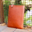 Vertical leather MacBook sleeve in Chestnut English Bridle, handcrafted in Texas
